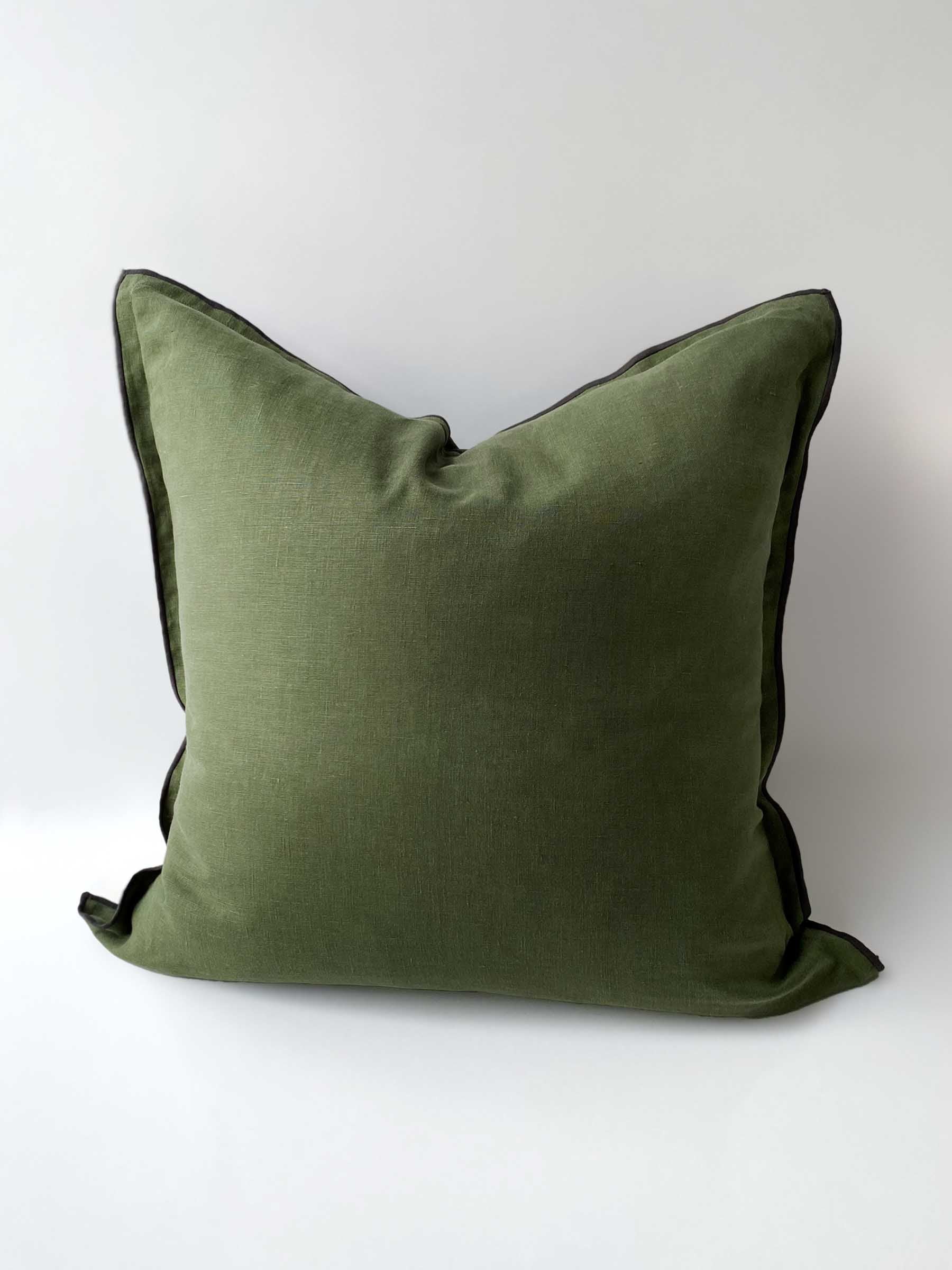 Harlow cushion in Basil colour 50cm square with overstitching trim in contrasting colour pepper made from French Flax linen